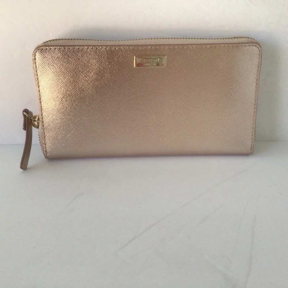 Kate Spade NWOT Rose Gold Zip Around Leather Wallet